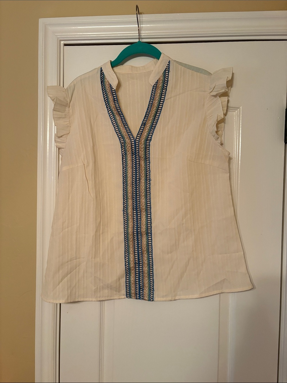 Sleeveless Cream Top with Blue Trim
